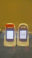 COBAS ACCU-CHECK INFORM II LOT OF (2) GLUCOSE METER WITH CHARGING BASE-NO POWER SUPPLY