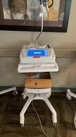 BURDOCK ELI 280 EKG MACHINE WITH AMXX SERIES PATIENT CABLE ON PORTABLE STAND