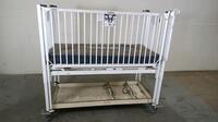 HARD INFANT CRIB