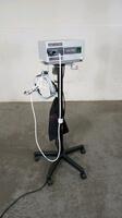 LUXTEC 9100 LIGHT SOURCE WITH HEADLIGHT ON ROLLING STAND