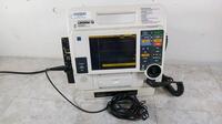 MEDTRONIC/PHYSIO-CONTROL LIFEPAK 12 3D BIPHASIC DEFIB WITH PACER, ANALYZE, CO2, SPO2, ECG, NIBP, PADDLES, ECG CABLE, AC POWER ADAPTER