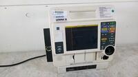 MEDTRONIC/PHYSIO-CONTROL LIFEPAK 12 BIPHASIC DEFIB WITH PACER, ANALYZE, ECG, AC POWER ADAPTER