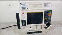 MEDTRONIC/PHYSIO-CONTROL LIFEPAK 12 BIPHASIC DEFIB WITH PACER, ECG, AC POWER ADAPTER