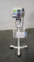 ALARIS/IVAC 4410 VITAL SIGNS MONITOR ON ROLLING STAND