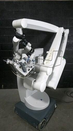 CARL ZEISS NC 4 SURGICAL MICROSCOPE TO INCLUDE TRIPLE MOUNT BINOCULARS W/EYEPIECES (10X) BOTTOM LENSE, FOOTSWITCH & SUPERLUX 301 LIGHT SOURCE