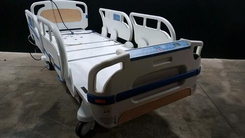 STRYKER SECURE 3002 S3 HOSPITAL BED WITH HEAD & FOOTBOARD (CHAPERONE WITH ZONE CONTROL, BED EXIT, SCALE) (IBED AWARENESS)