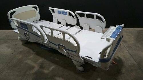 STRYKER SECURE 3002 S3 HOSPITAL BED WITH HEAD & FOOTBOARD (CHAPERONE WITH ZONE CONTROL, BED EXIT, SCALE) (IBED AWARENESS)