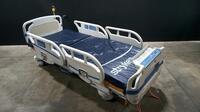 STRYKER SECURE 3002 S3 HOSPITAL BED WITH HEAD & FOOTBOARD (CHAPERONE WITH ZONE CONTROL, BED EXIT, SCALE) (IBED AWARENESS)