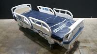 STRYKER SECURE 3002 S3 HOSPITAL BED WITH HEAD & FOOTBOARD (CHAPERONE WITH ZONE CONTROL, BED EXIT, SCALE) (IBED AWARENESS)