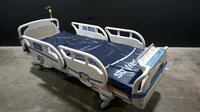 STRYKER SECURE 3002 S3 HOSPITAL BED WITH HEAD & FOOTBOARD (CHAPERONE WITH ZONE CONTROL, BED EXIT, SCALE) (IBED AWARENESS)