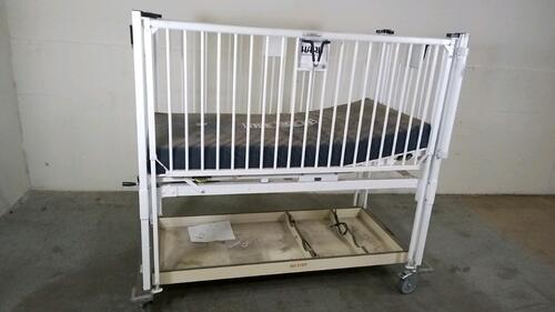 HARD INFANT CRIB