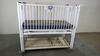 HARD INFANT CRIB