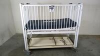 HARD INFANT CRIB