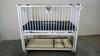 HARD INFANT CRIB