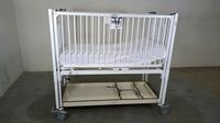 HARD INFANT CRIB