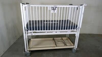 HARD INFANT CRIB