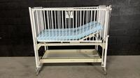 HARD INFANT CRIB