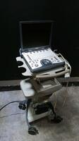 GE LOGIQ E PORTABLE ULTRASOUND MACHINE WITH 1 PROBE (12L) (SERIAL# 64380WX9) (DOM: 8/2007)