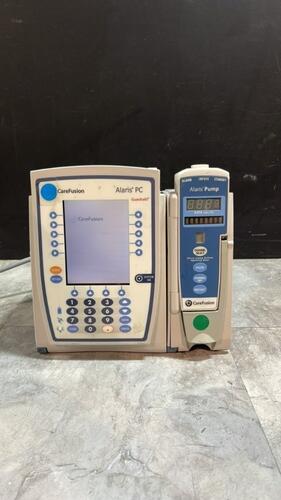 ALARIS PC 8015 SERIES INFUSION PUMP WITH ALARIS PUMP 8100 SERIES MODULE