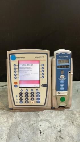 ALARIS PC 8015 SERIES INFUSION PUMP WITH ALARIS PUMP 8100 SERIES MODULE