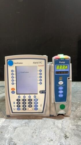 ALARIS PC 8015 SERIES INFUSION PUMP WITH ALARIS PUMP 8100 SERIES MODULE