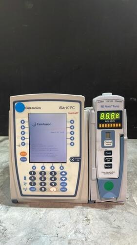 ALARIS PC 8015 SERIES INFUSION PUMP WITH ALARIS PUMP 8100 SERIES MODULE