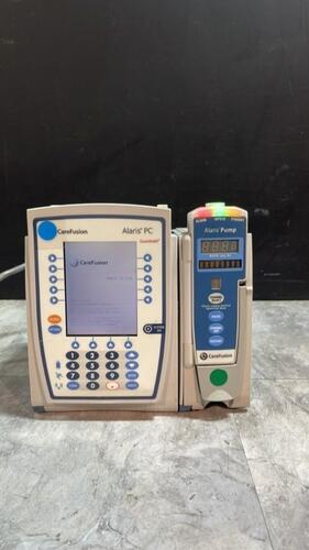 ALARIS PC 8015 SERIES INFUSION PUMP WITH ALARIS PUMP 8100 SERIES MODULE