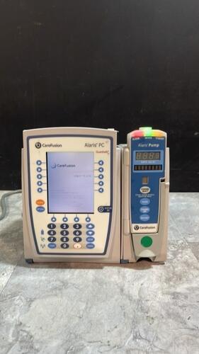 ALARIS PC 8015 SERIES INFUSION PUMP WITH ALARIS PUMP 8100 SERIES MODULE