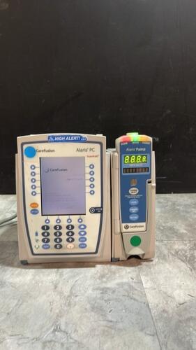 ALARIS PC 8015 SERIES INFUSION PUMP WITH ALARIS PUMP 8100 SERIES MODULE