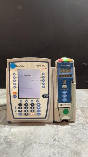 ALARIS PC 8015 SERIES INFUSION PUMP WITH ALARIS PUMP 8100 SERIES MODULE