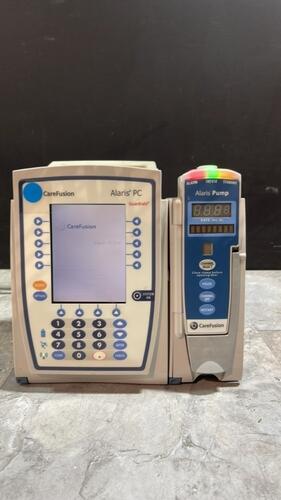 ALARIS PC 8015 SERIES INFUSION PUMP WITH ALARIS PUMP 8100 SERIES MODULE