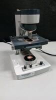 AMERICAN OPTICAL ONE-TEN LAB MICROSCOPE WITH 3 OBJECTIVES