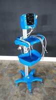 GE CARESCAPE V100 PATIENT MONITOR ON ROLLING STAND