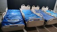 LOT OF HILL-ROM VERSACARE HOSPITAL BEDS