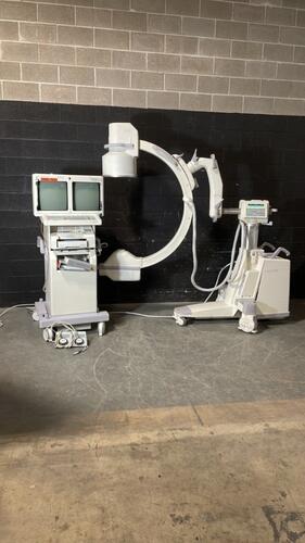 GE SERIES 9800 VASCULAR C-ARM SYSTEM TO INCLUDE DUAL MONITOR WORKSTATION W/FOOTSWITCH (SERIAL# 82-0221) (DOM: 12/1999)