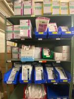 SHELVING UNIT TO INCLUDE: ASSORTED MOLNLYCKE SURGICAL GLOVES