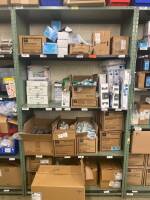 SHELVING UNIT TO INCLUDE: PATIENT BELONGINGS BAGS, MOUTHWASH, SHAMPOO, COMBS, ORAL CARE KITS