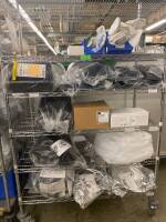 CART AND CONTENTS: 3M STERI DRAPES, STRYKER FEMORAL CANAL BRUSHES, BREG LEG BRACES, SYRINGES, TUBING