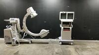 GE OEC 9800 PLUS ESP C-ARM SYSTEM WITH 9 INCH II TO INCLUDE DUAL MONITOR WORKSTATION WITH HAND CONTROL & FOOTSWITCH (SERIAL# 89-2551) (DOM: 5/2004)