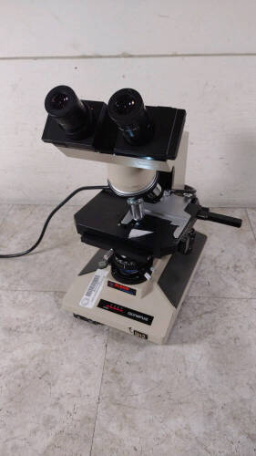 OLYMPUS BH-2 LAB MICROSCOPE WITH 2 EYEPIECES (WHK 10X/20 L) AND 4 OBJECTIVES (4, 10, 40)